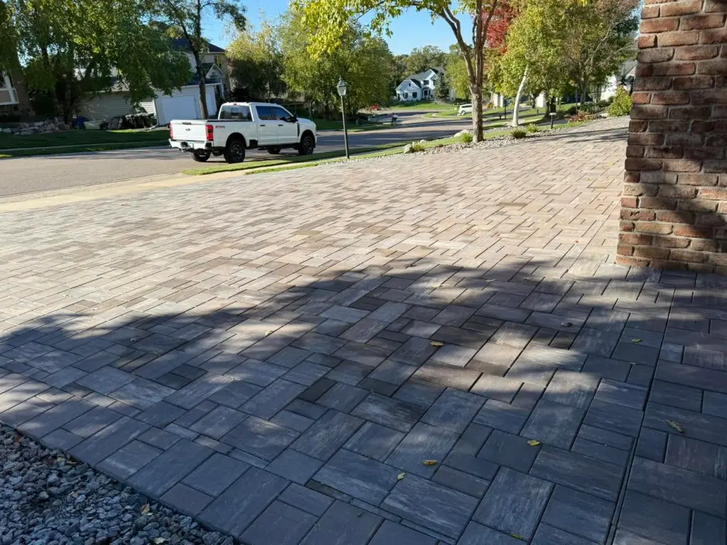 Paver driveway with shadows from trees in Lakeville, MN